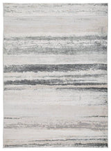 Ashley Furniture Abanett Rug featuring a plush, patterned design perfect for living room or bedroom decor.