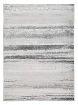 Ashley Furniture Abanett Rug featuring a plush, patterned design suitable for living rooms or bedrooms.