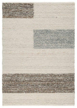 Ashley Furniture Barus Rug featuring a soft, woven design in neutral tones, perfect for adding warmth to living spaces.