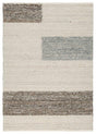 Ashley Furniture Barus Rug featuring a soft, woven design in neutral tones, perfect for adding warmth to living spaces.