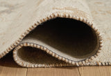 Close-up of Ashley Furniture Calkin Rug showcasing its detailed woven pattern and soft texture in neutral tones.