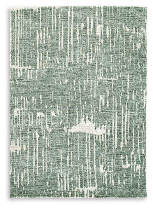 Ashley Furniture Cayworth Rug showcasing a plush, patterned design in neutral tones for a cozy, stylish living room ambiance.