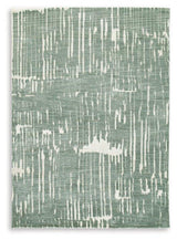 Ashley Furniture Cayworth Rug showcasing a plush, patterned design in neutral tones for a cozy, stylish living room ambiance.