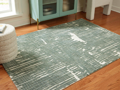 Ashley Furniture Cayworth Rug with intricate patterns in warm tones, showcasing a plush, textured surface for cozy home decor.