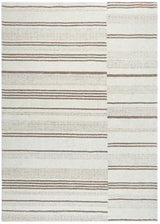 Ashley Furniture Gadence area rug with intricate patterns in neutral tones, showcasing a plush, woven texture.
