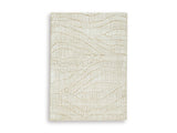 Ashley Furniture Jaseena area rug featuring a plush, patterned design in neutral tones, suitable for living rooms or bedrooms.