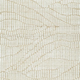 Ashley Furniture Jaseena area rug with intricate patterns and soft texture, shown in a close-up swatch image.