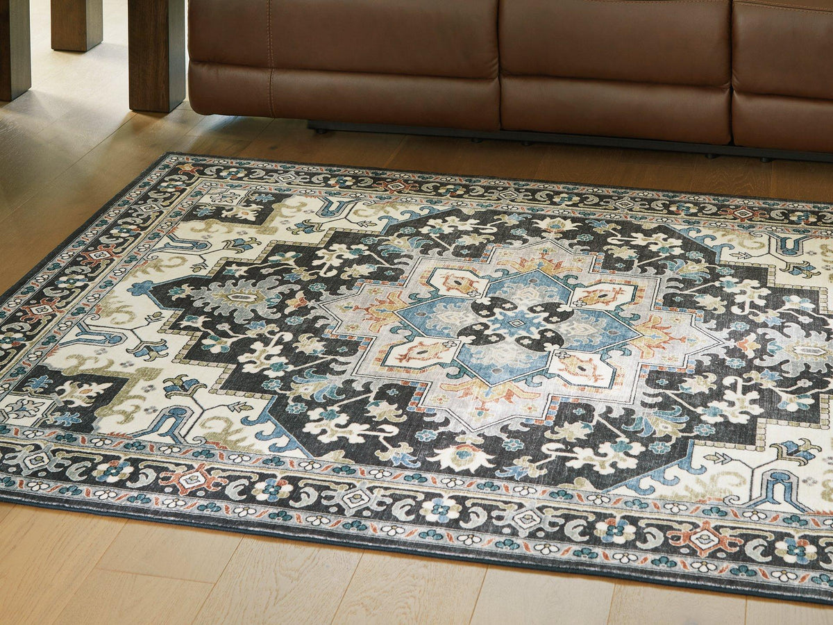 Ashley Furniture Leningston washable rug featuring a modern design with soft, durable fabric in neutral tones.