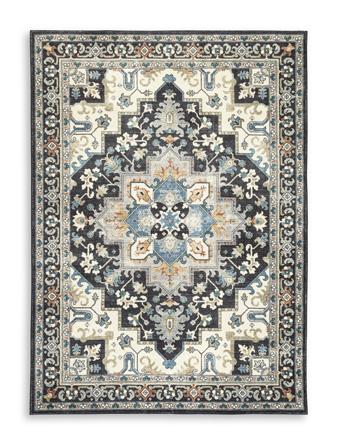 Ashley Furniture Leningston washable rug with a soft, patterned design suitable for living rooms and bedrooms.