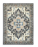 Ashley Furniture Leningston washable rug with a soft, patterned design suitable for living rooms and bedrooms.