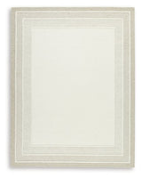 Ashley Furniture Teelgan Rug with intricate patterns in warm tones, ideal for adding style to living spaces.