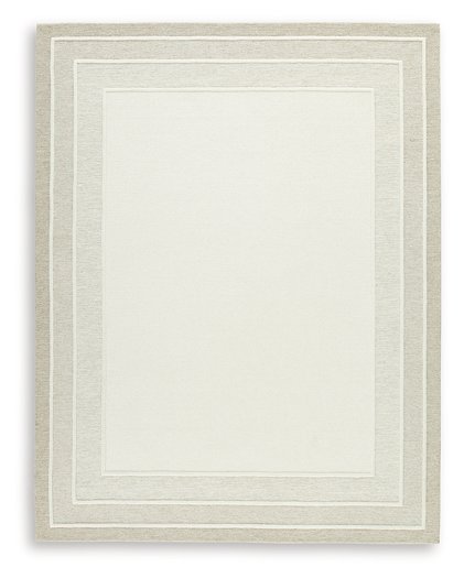Ashley Furniture Teelgan Rug with intricate patterns in warm tones, ideal for adding style to living spaces.