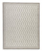 Ashley Furniture Wimney Rug with intricate woven pattern in neutral tones, showcasing its textured surface and stylish design.