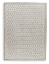 Ashley Furniture Wimney Rug featuring a soft, textured design with neutral tones, ideal for contemporary living room decor.
