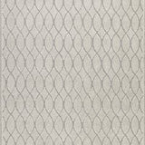 Close-up of the Ashley Furniture Wimney Rug swatch showing textured woven pattern and neutral earthy tones.