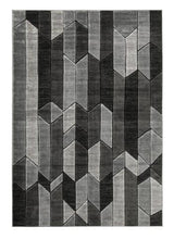 Ashley Furniture Chayse 5' x 6'7" rug with a stylish pattern and soft texture, perfect for enhancing living room decor.