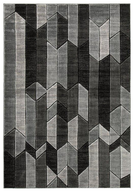 Ashley Furniture Chayse 6'6" x 9'6" rug with a modern geometric pattern in neutral tones.