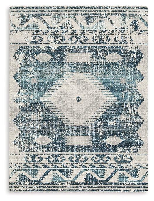 Ashley Furniture Daddridge 5' x 7' Rug with intricate patterns and soft texture, ideal for living rooms or bedrooms.