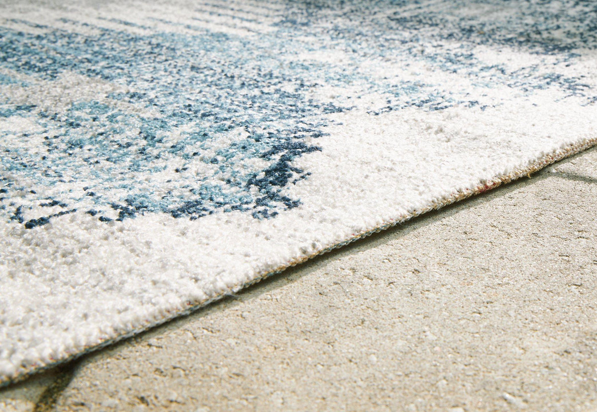 Ashley Furniture Daddridge 8' x 10' rug with intricate patterns and soft texture, ideal for living room or bedroom decor.