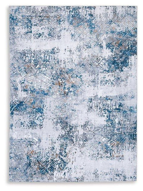 Ashley Furniture Garyard 5' x 7' rug with intricate patterns in neutral tones, perfect for living rooms or bedrooms.