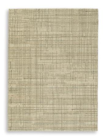 Ashley Furniture Janston Rug featuring a plush, patterned design ideal for living room or bedroom decor.