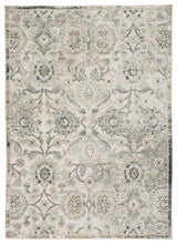 Kilkenny rug by Ashley Furniture in 7'10" x 10'2" size, featuring a stylish pattern in neutral tones.