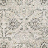 Ashley Furniture Kilkenny rug, 7'10" x 10'2", featuring intricate patterns and soft textures, perfect for living room decor.