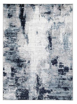 Ashley Furniture Leonelle 5'3" x 7'3" rug with intricate pattern and soft texture, ideal for living rooms and bedrooms.