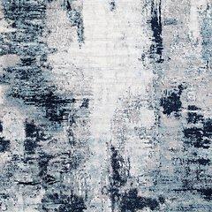 Ashley Furniture Leonelle 5'3" x 7'3" rug with intricate patterns and soft texture, perfect for living room or bedroom decor.