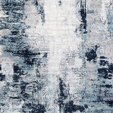 Ashley Furniture Leonelle 5'3" x 7'3" rug with intricate patterns and soft texture, perfect for living room or bedroom decor.