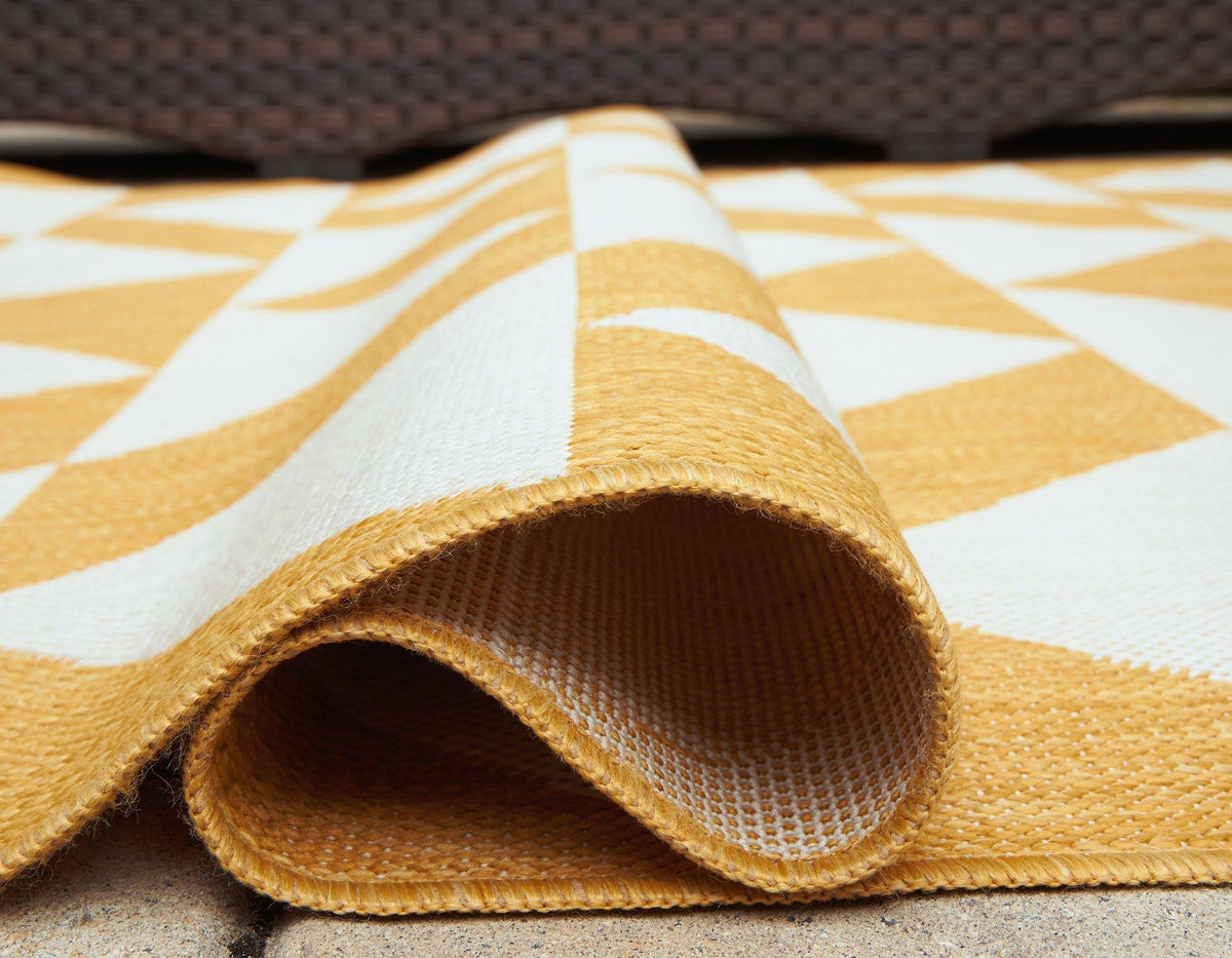 Ashley Furniture Thomley 5x7 rug with intricate pattern and soft texture, perfect for adding warmth to living spaces.
