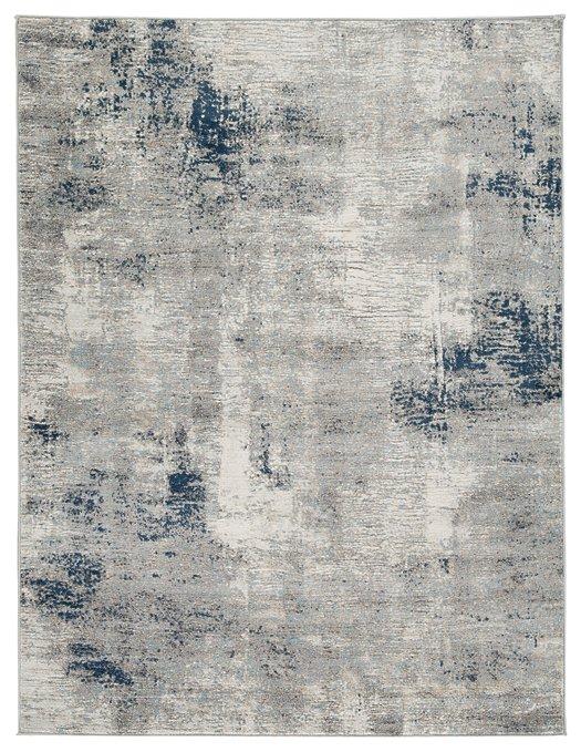 Ashley Furniture Wrenstow 7'10" x 10'3" rug with intricate pattern and soft texture, ideal for living rooms or bedrooms.