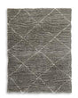 Wrenlow Rug by Ashley Furniture featuring intricate geometric patterns in neutral tones, perfect for living room or bedroom decor.
