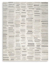 Large Leesdale 8x10 rug from Ashley Furniture featuring a soft, woven design perfect for living rooms and bedrooms.