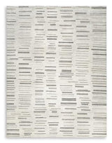 Large Leesdale 8x10 rug from Ashley Furniture with intricate patterns and soft texture, ideal for living rooms or bedrooms.