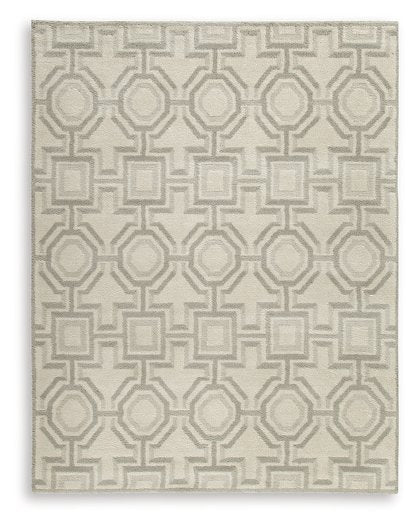 Large Maconville rug by Ashley Furniture with intricate patterns in warm tones, ideal for living room or bedroom decor.