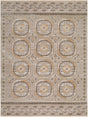 Medium Ashley Furniture Bachby Area Rug with intricate geometric patterns in neutral tones laying on a hardwood floor.