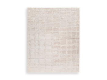 Medium washable area rug from Ashley Furniture with a soft, textured design perfect for living rooms and bedrooms.