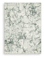 Medium Ashley Furniture Tobinbury washable area rug with a soft, textured design in neutral tones, suitable for living spaces.