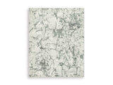 Medium Ashley Furniture Tobinbury washable area rug with a stylish pattern and soft texture, suitable for living rooms and bedrooms.