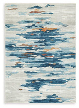 Medium washable rug by Ashley Furniture with a soft, patterned design, perfect for living rooms or bedrooms.