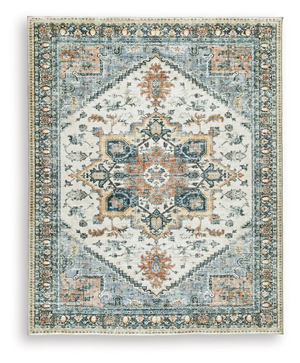 Medium Ashley Furniture Wallney Area Rug with intricate patterns, showcasing soft, plush fabric in warm tones.