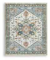 Medium Ashley Furniture Wallney Area Rug with intricate patterns, showcasing soft, plush fabric in warm tones.