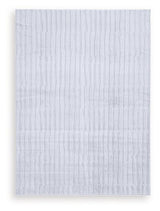 Medium washable area rug by Ashley Furniture with a textured design, perfect for living rooms and bedrooms.