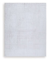 Medium washable area rug by Ashley Furniture with a stylish design, perfect for enhancing living spaces.