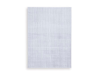 Medium washable area rug by Ashley Furniture featuring a stylish design, perfect for living spaces and easy to clean.