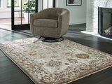 Ainswick memory foam rug by Ashley Furniture, 4x3 feet, soft textured surface, in neutral color for cozy home decor.