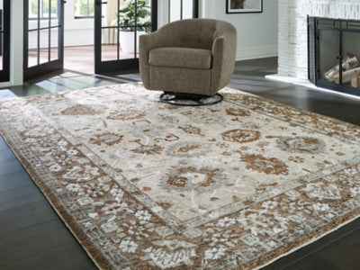 Ashley Furniture Ainswick memory foam rug with plush, textured surface in a 4x3 size for cozy home decor.