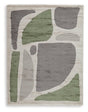 Ashley Furniture Anburgh Rug with intricate pattern in warm tones, showcasing soft, woven textile design.