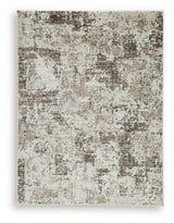 Ashley Furniture Barricland Rug with intricate pattern, soft texture, and neutral colors, perfect for enhancing living room decor.